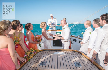 Bride and Groom getting married on a Sailboat in Boston Harbor with Classic Harbor Line