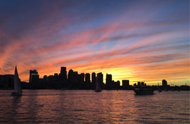 The Boston Skyline at Sunset aboard the yacht Northern lights for a Boston Sunday Evening Jazz Cruise